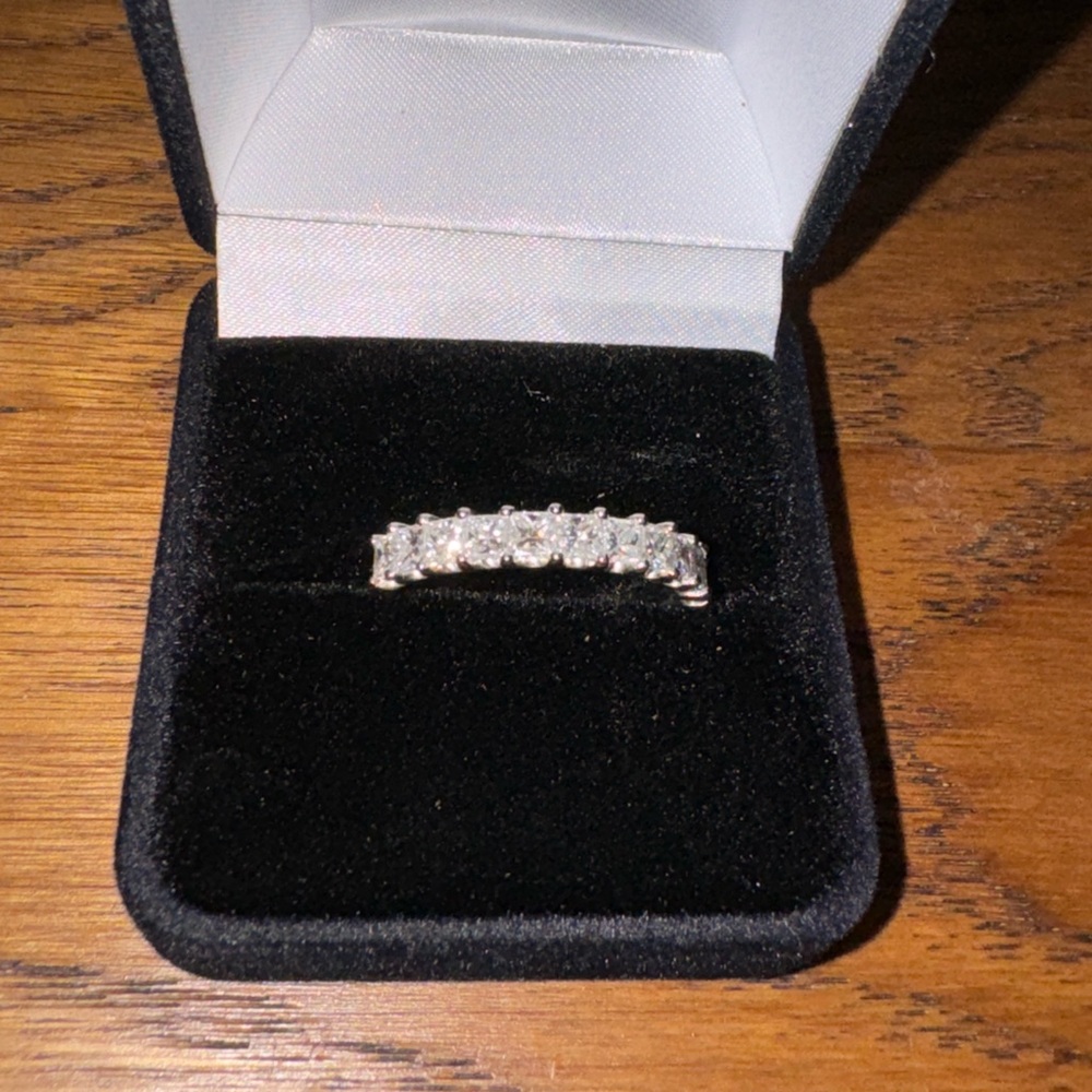 Custom prong set semi eternity bands set in Platinum